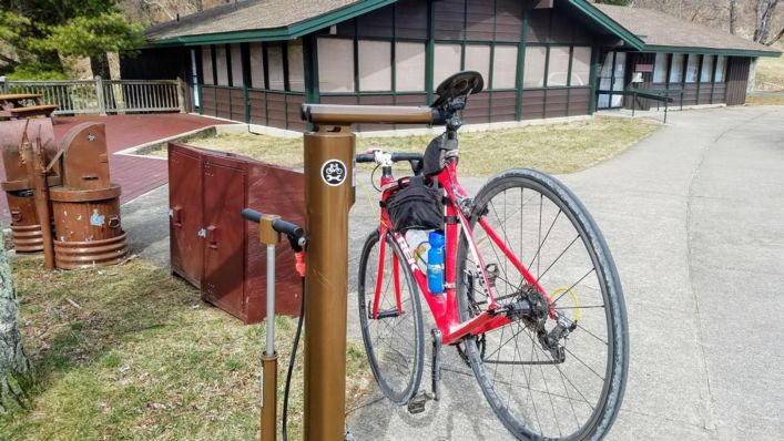 Bike travel in National Parks: A repair stand and bike pump provide emergency bike maintenance along Skyline Drive. 